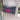 Wall Mount Mailbox mounted to outdoor wall. ButterFly Box in designer gray and neon pink