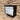 Wall Mount Mailbox mounted to outdoor wall. RetroBox in jet black and white