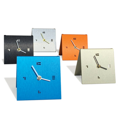 The SimpleDesk Clock Modern Desk Clock in jet black, aqua, orange and mid-century gold
