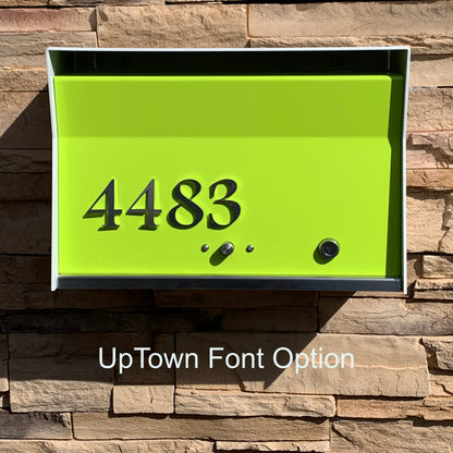Wall Mount Mailbox mounted to outdoor wall. RetroBox in arctic white and lemon lime